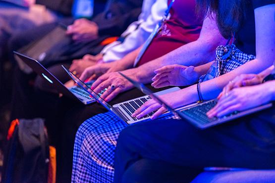 BIO 2019 Keynote Attendees on laptop