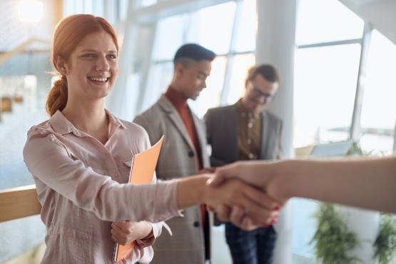 woman shaking hand