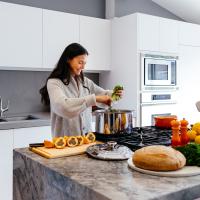 Woman cooking in kitchen
